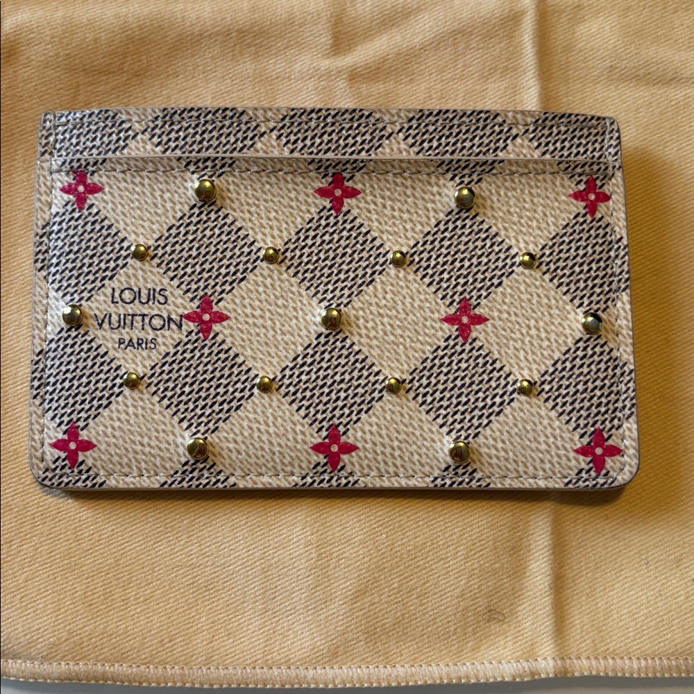 Louis Vuitton Damier Azur Studded Card Holder in the white and pink color